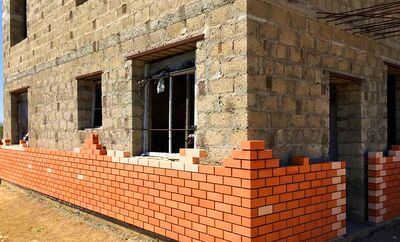 Облицовка фасада дома кирпичом или камнем Шаховская