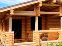 Дом из оцилиндрованного бревна